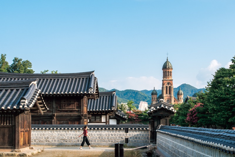 Jeonju, South Korea - August 3 2017: Jeonju Hanok Village and Jeondong Catholic Church. The village containing over 800 Korean traditional houses famous among Koreans and tourists